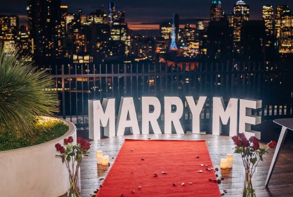 Red Carpet and Roses Rooftop Proposal